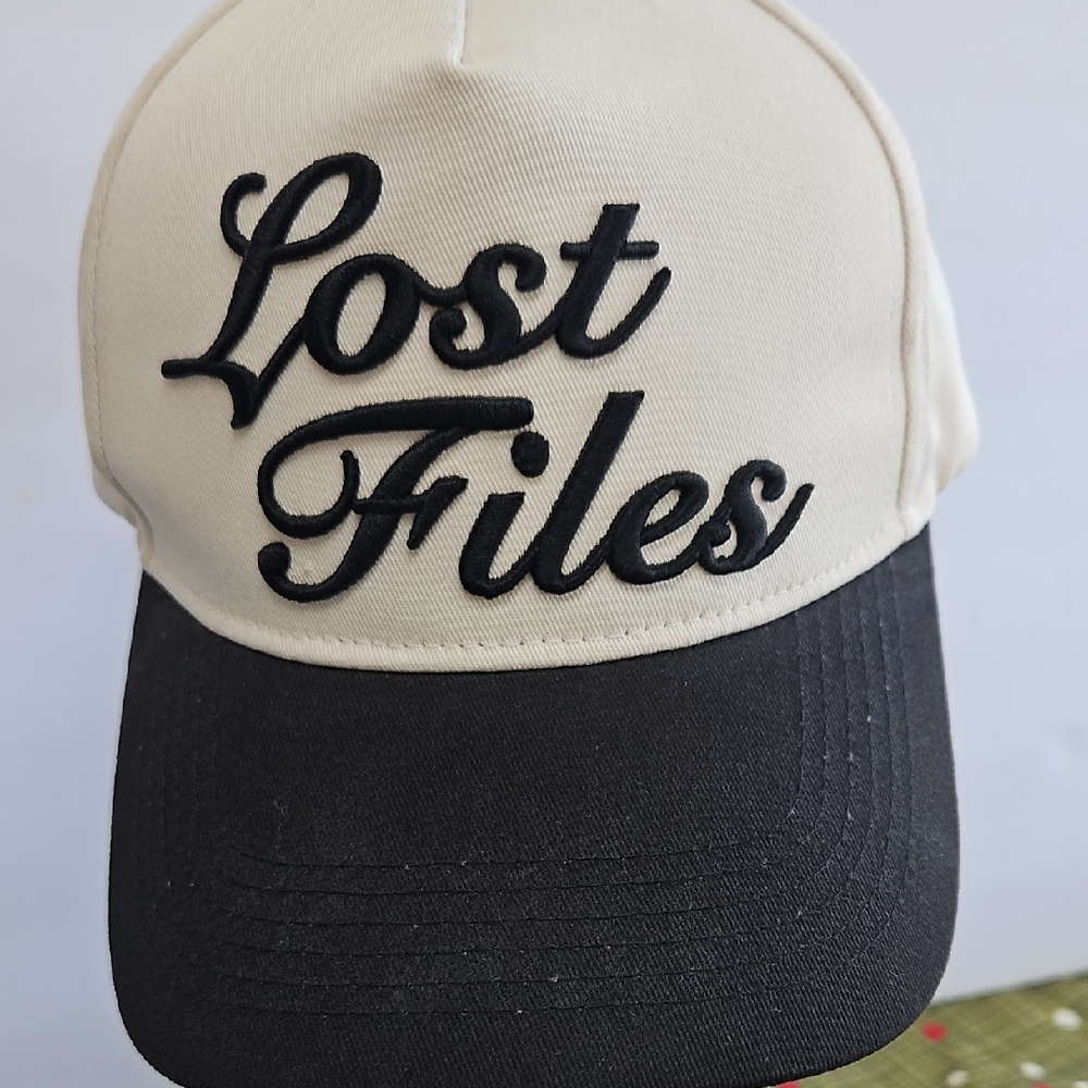 Lost Files Two-Tone Trucker Cap - Cream & Black. Snap Back
